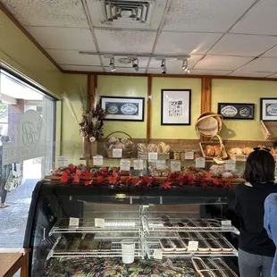 two people in a bakery