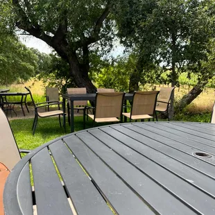 a table and chairs outside