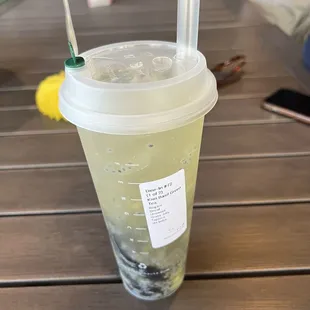 Kiwi basil with tea replaced with sparkling water, light boba, and grass jelly, no additional sugar