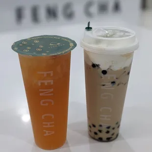 Grapefruit tea and the Black Milk Tea with boba and soft top.