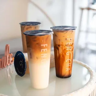 two iced coffees on a table