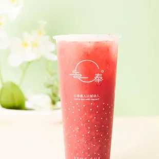 a cold drink in a plastic cup