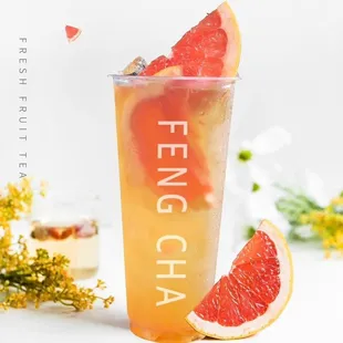 a glass of lemonade and grapefruit