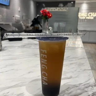 Lychee oolong tea with added boba