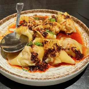 Pork Wontons, highly recommend. Garlic is a nice touch.