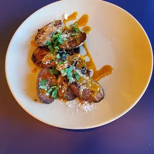 a plate of food on a blue table
