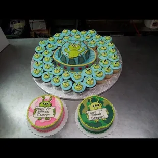 a cake and cupcakes