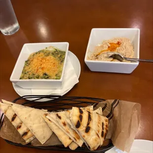 Hummus and spinach and artichoke dip