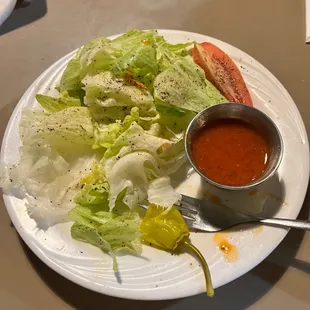 Simple dinner salad with House vinaigrette. Yummy.