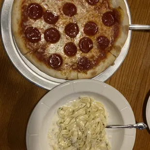 Fettuccini alfredo with homemade pasta and small pepperoni pizza. They were DELICIOUS!!