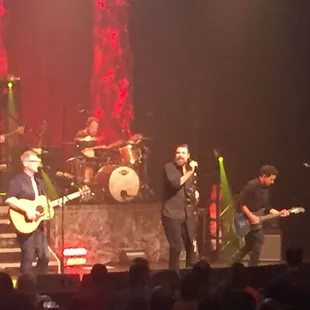 a band performing on stage