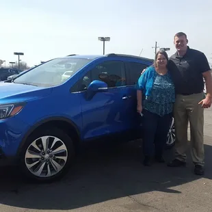 My new friend Jack Jewel Salesman Extraordinaire next to my beautiful Coastal Blue Buick Encore!