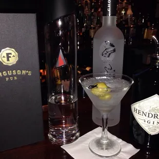 a martini and a bottle of gin