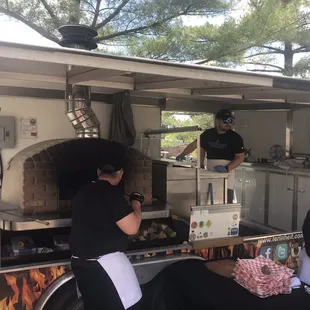 two people preparing food