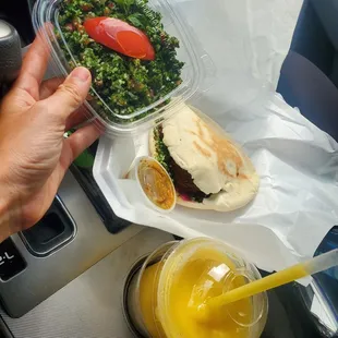 Homemade fresh Falafel pita, AMAZING ginger sauce. Tabula! And Mango smoothie..... HEAVEN!  Smiling from ear to ear.