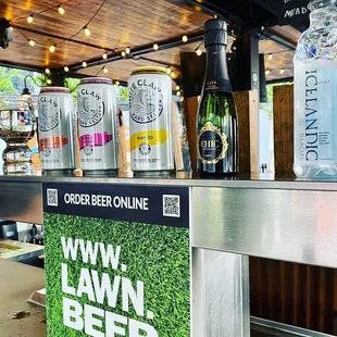 bottles of beer on a bar