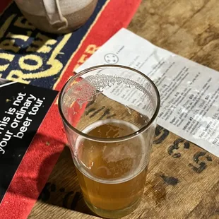 a glass of beer on a table