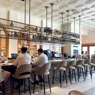 people sitting at a bar