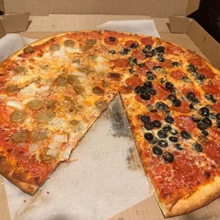 A pie I ordered on Pi Day. 1/2 pep, olive and 1/2 sausage, onion