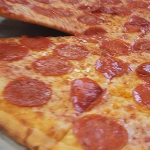 Delicious large pepperoni pizza