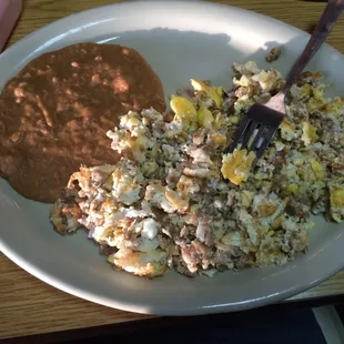 The mixed American sausage and egg plate with refried beans