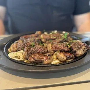 Brazilian dish called Picahna featuring steak.