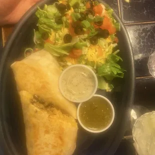 Chicken burrito with a side salad