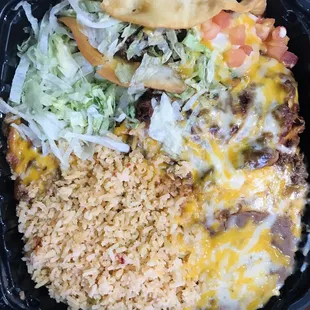3. Tamale Combo - Taco, enchilada and tamale w/ beans and rice