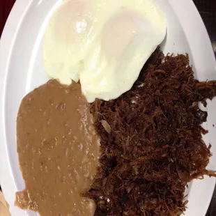 Barbacoa with eggs on the side.