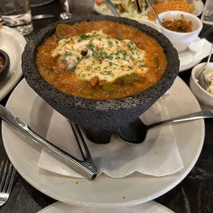 Mexican stew in a Stone bowl - Molcajete.