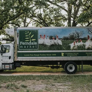 a truck with a large advertisement on the side