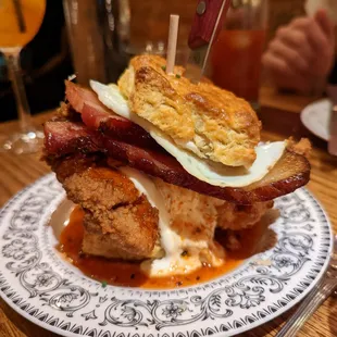 fried chicken biscuit with the works (bacon and egg)