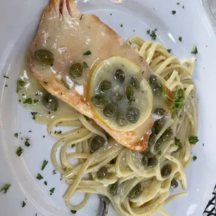 We had a lovely dinner at Ferrante. Lemon salmon and Cappelli Pomodoro with shrimp. The food was tasty, hot, and presented beautifully.