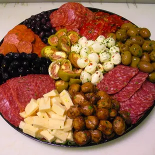 a platter of meats and cheeses
