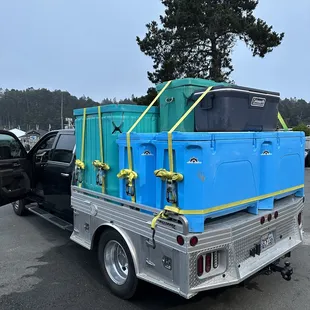 the back end of a blue truck