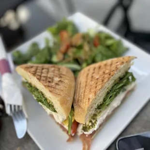 a sandwich and salad on a plate