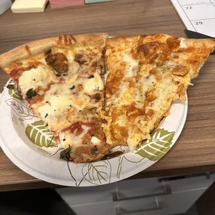 Work catered in pizza! Buffalo Chicken on the right and Bolognese on the left, both huge and delicious