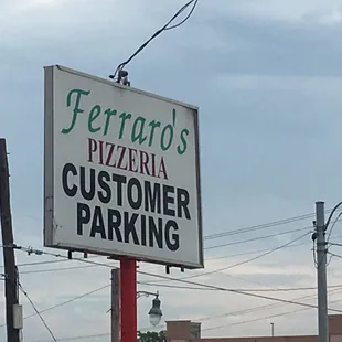 Park in the lot next door for free.