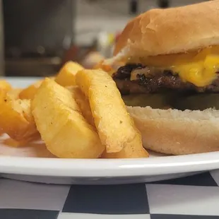 a cheeseburger and fries