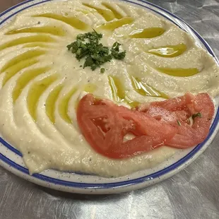 Hummus which came on a real plate
