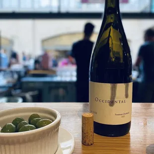 2021 Occidental Pinot Noir with green olives for snacking.
