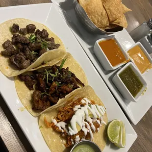 Salsa sampler, Carne asada (beef steak) Tacos, Tacos al Pastor, Tinga de Pollo Tacos.