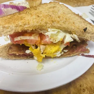 Fertittas BLT Sandwich with a friend egg