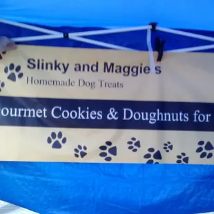 Slinky and Maggie's shop is in Greenwood. His doggie cookies are our dogs favorites. Catch him at a festival or in Greenwood.