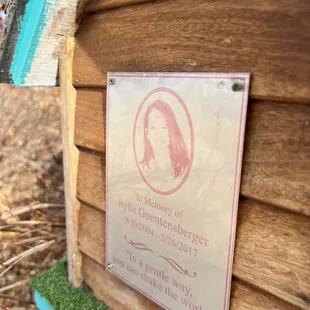 Tribute on side of little library