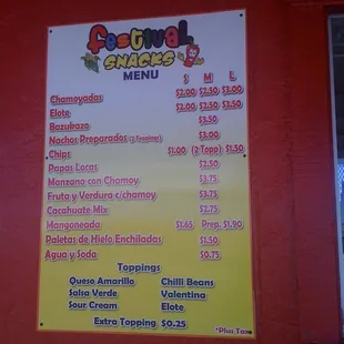 a menu on a red wall