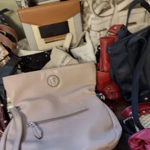 Lots of purses including designers, kors, Claiborne, etc