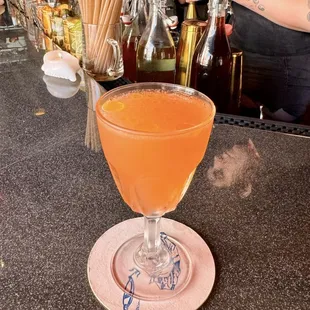 Sour cocktail - granja nomada mezcal, aperol, genepy, lemon, evoo