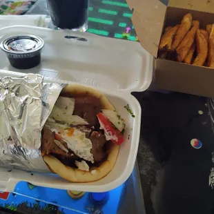 Classic gyro, $7.25. side of Greek seasoned fries, $2.50