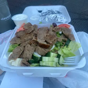 Greek salad to go. With Tzaziki sauce.